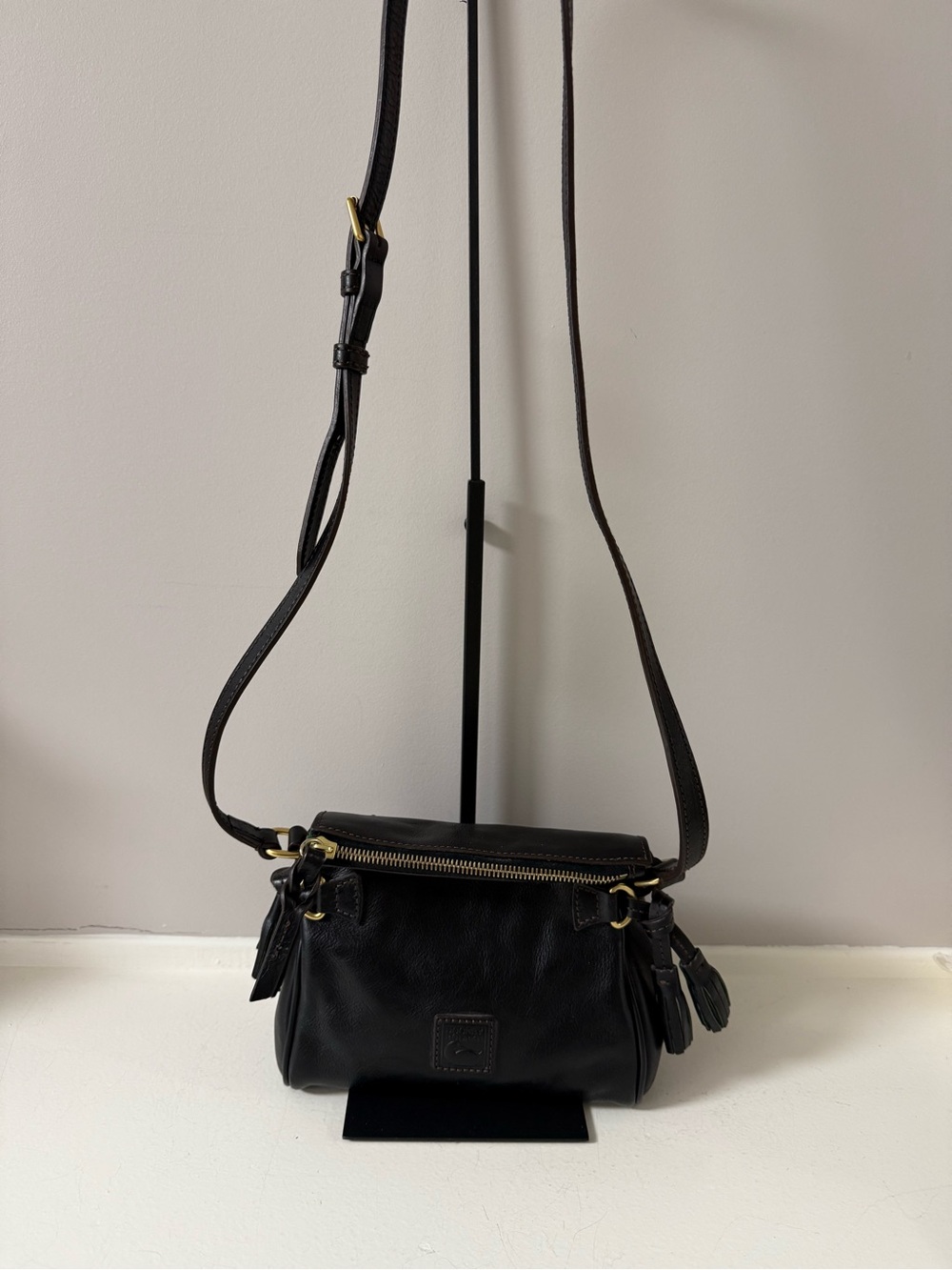 Dooney & Bourke Black Leather Crossbody with Tassel Accents
